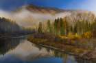 Foggy autumn sunrise on McDonald Creek and Apgar Mountain in Glacier National Park, Montana, USA Art Print